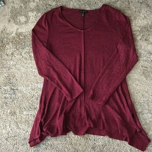 Red/maroon v-neck sweater. Like new. Very soft material. Size M.